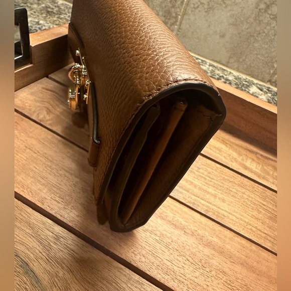 Michael Kors wallet brand new never used. Brown with gold accents. $148 new. - Picture 14 of 14